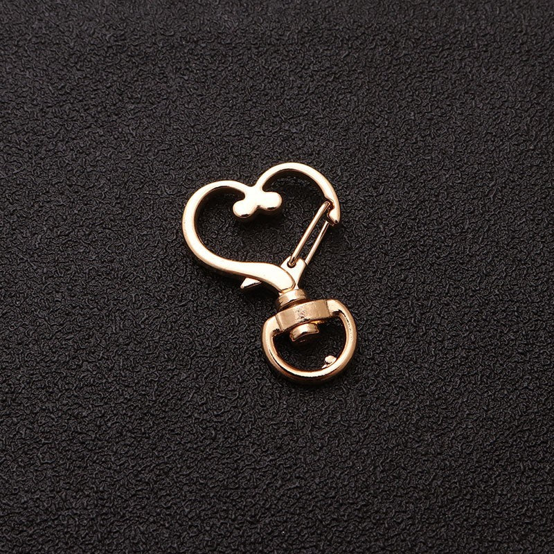 Wholesale shaped keychain metal cat dolphin love five-pointed star cherry blossom shell jewelry accessories diy